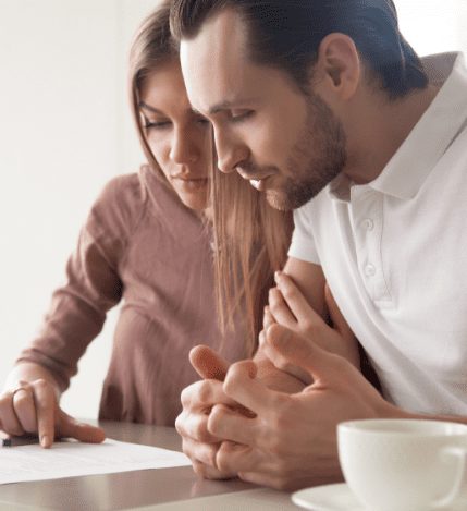 couple looking at vrm lending home buyer checklist